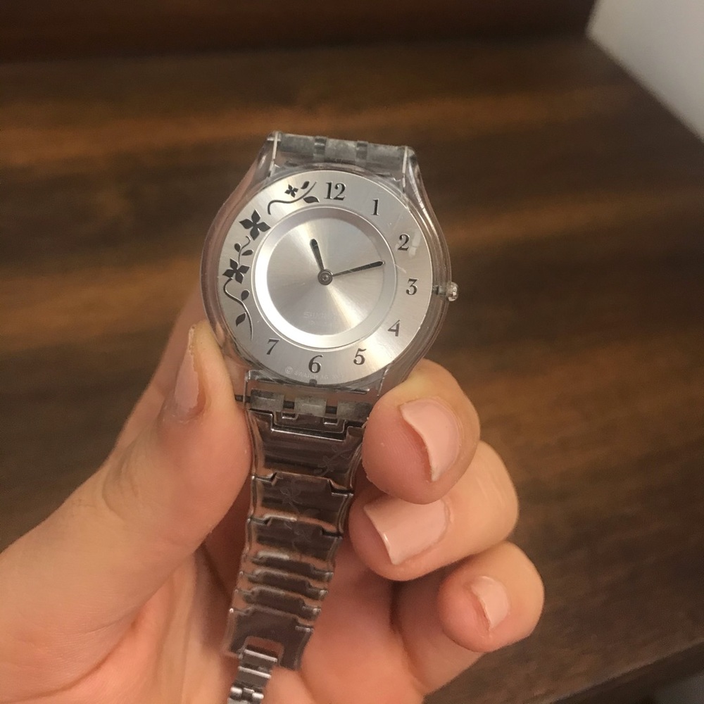 Swatch stainless steel watch with floral details